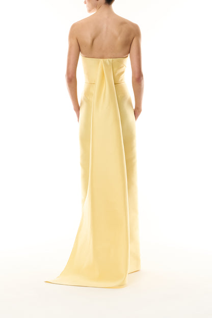 Monique Lhuillier Fall 2026 Pale yellow Mikado Piqué strapless column gown with train - back.