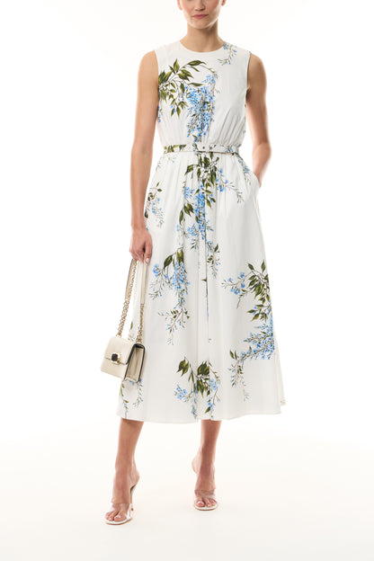 Monique Lhuillier Fall 2026 White/Multi Wisteria Printed Stretch Cotton Poplin day dress with belt and pockets - front with Cream Rhea Mini Shoulder Bag.