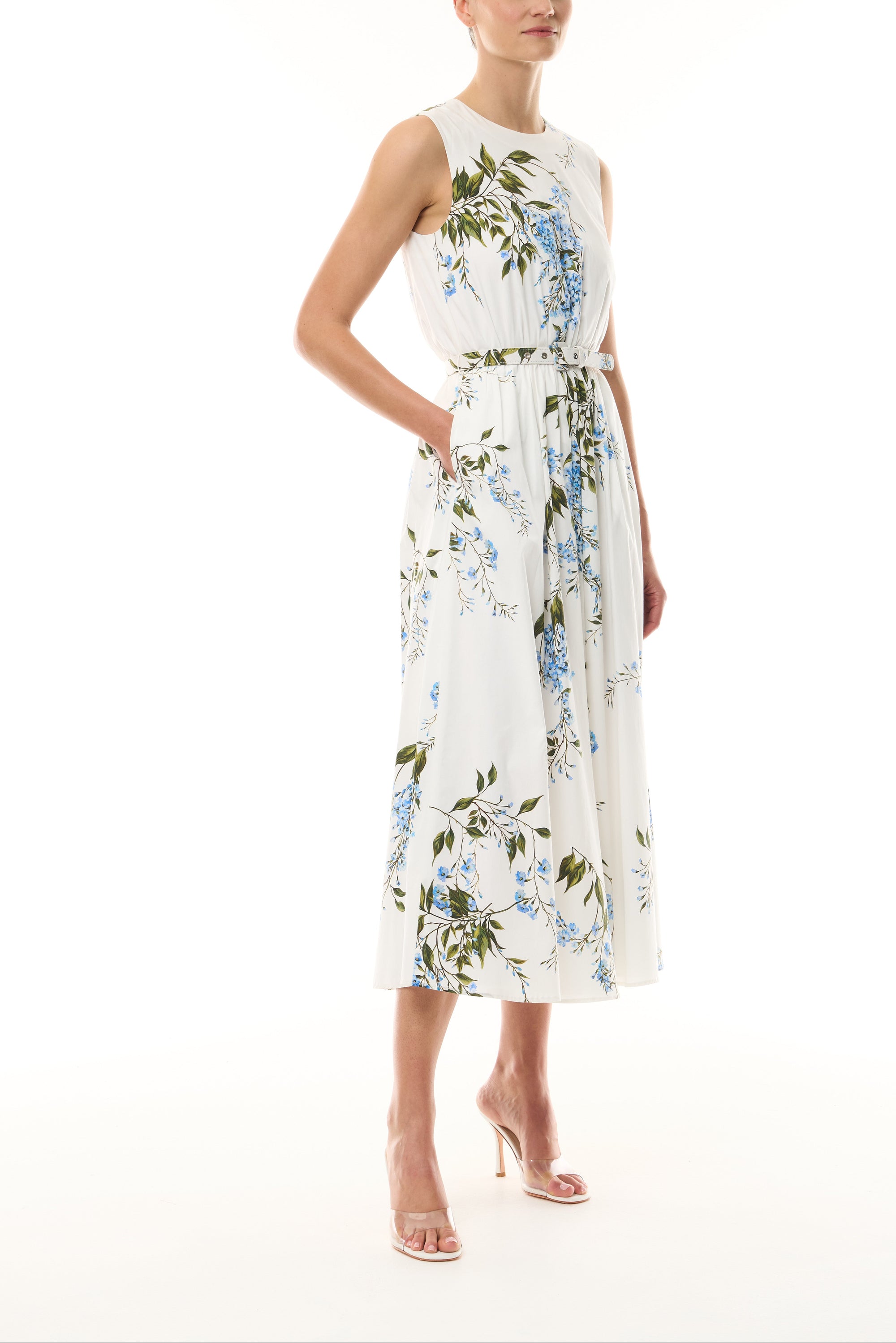 Monique Lhuillier Fall 2026 White/Multi Wisteria Printed Stretch Cotton Poplin day dress with jewel neckline, belt, pockets and a-line skirt - side.