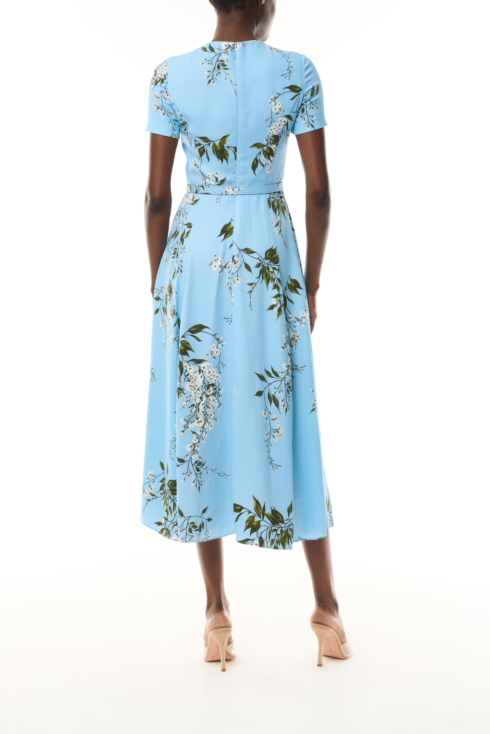 Monique Lhuillier Fall 2026 Short Sleeve Belted Dress in Horizon Blue Wisteria Printed Crepe - back.