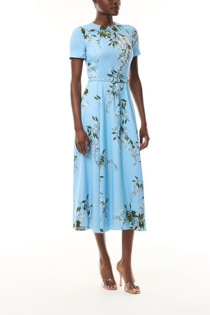 Monique Lhuillier Fall 2026 Short Sleeve Belted Dress in Horizon Blue Wisteria Printed Crepe - side.
