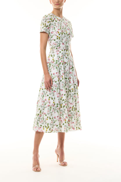 Monique Lhuillier Fall 2026 Short Sleeve Floral Day Dress in Silk White/Multi Ivy Bloom Printed Stretch Cotton Poplin with jewel neckline, belt, pockets and a-line skirt - side. 