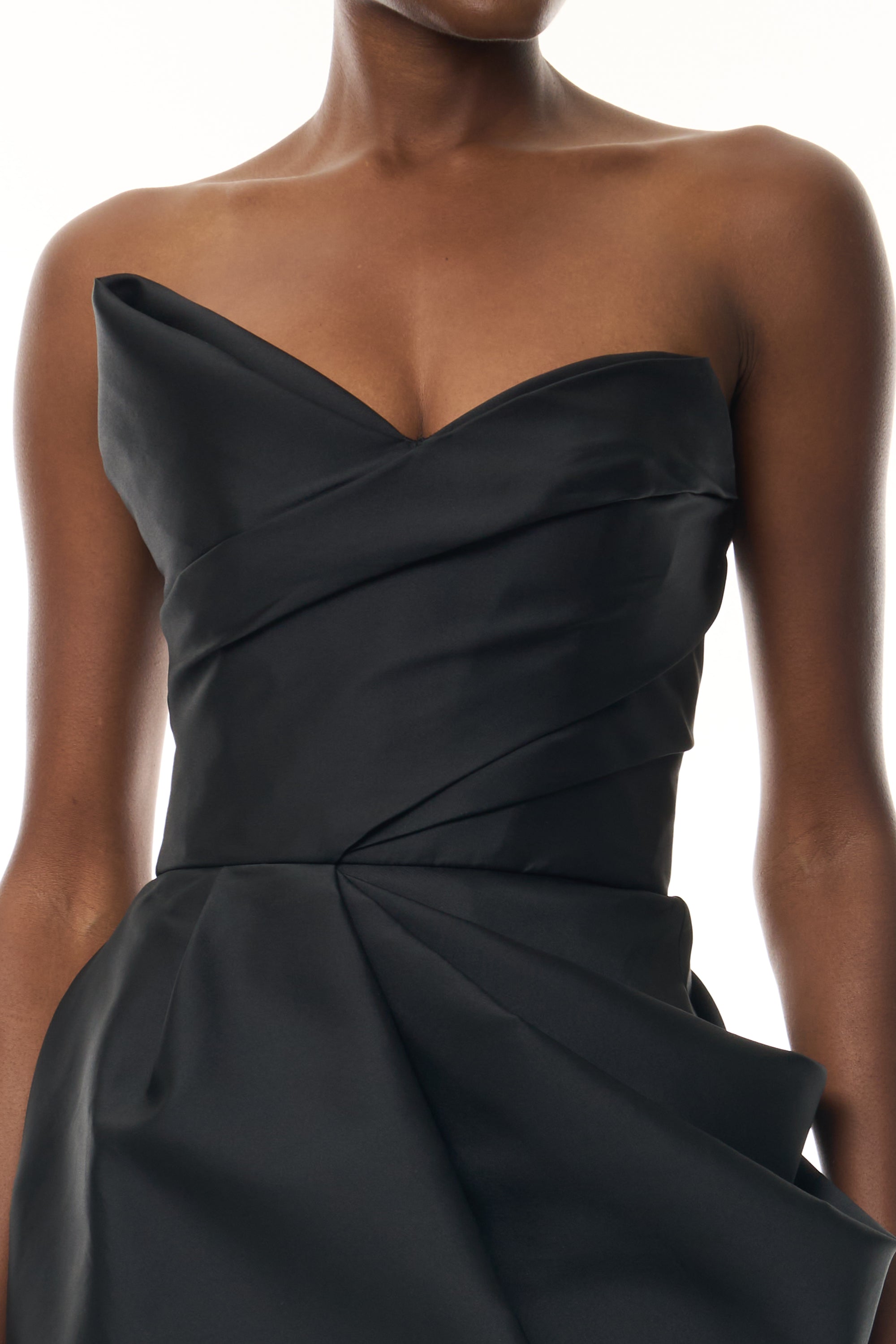 Monique Lhuillier Fall 2026 Strapless Mini Cocktail Dress in Noir Mikado with draped skirt and asymmetrical neckline - fabric.