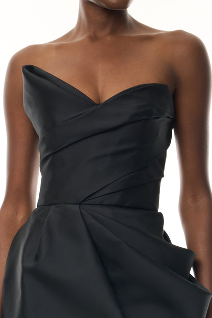 Monique Lhuillier Fall 2026 Strapless Mini Cocktail Dress in Noir Mikado with draped skirt and asymmetrical neckline - fabric.