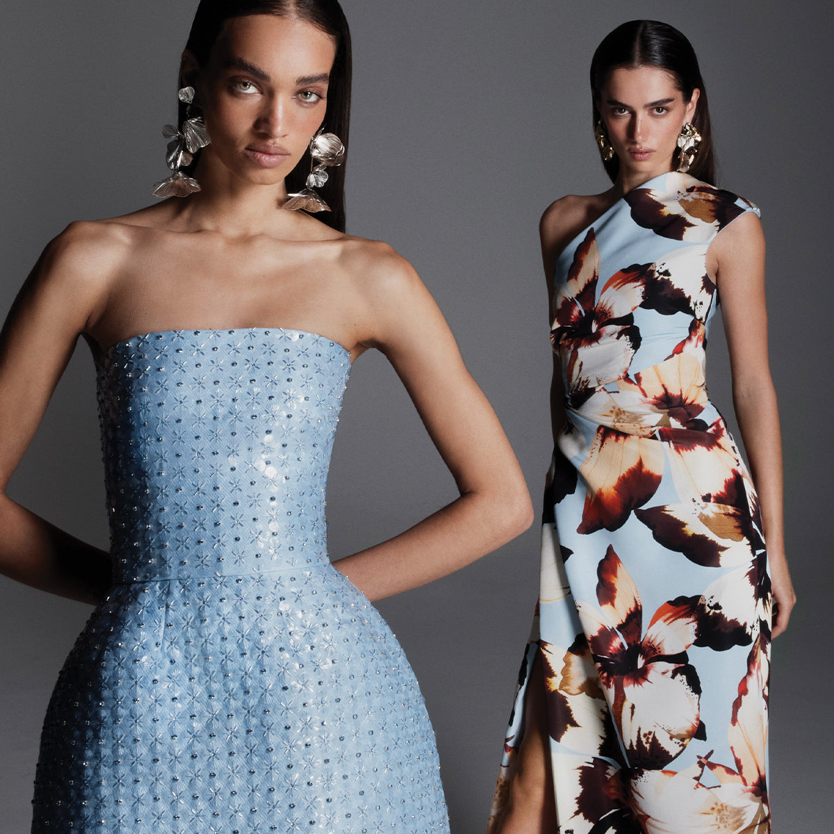 Monique Lhuillier Fall 2026 pale blue embroidered Mikado pique strapless structured mini dress; model on blue/floral Amber Lily printed faille one shoulder gown - lookbook.