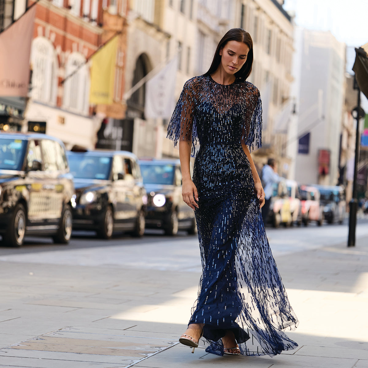 Monique Lhuillier Fall 2026 navy sequin embroidered tulle gown with integral capelet - lookbook. 