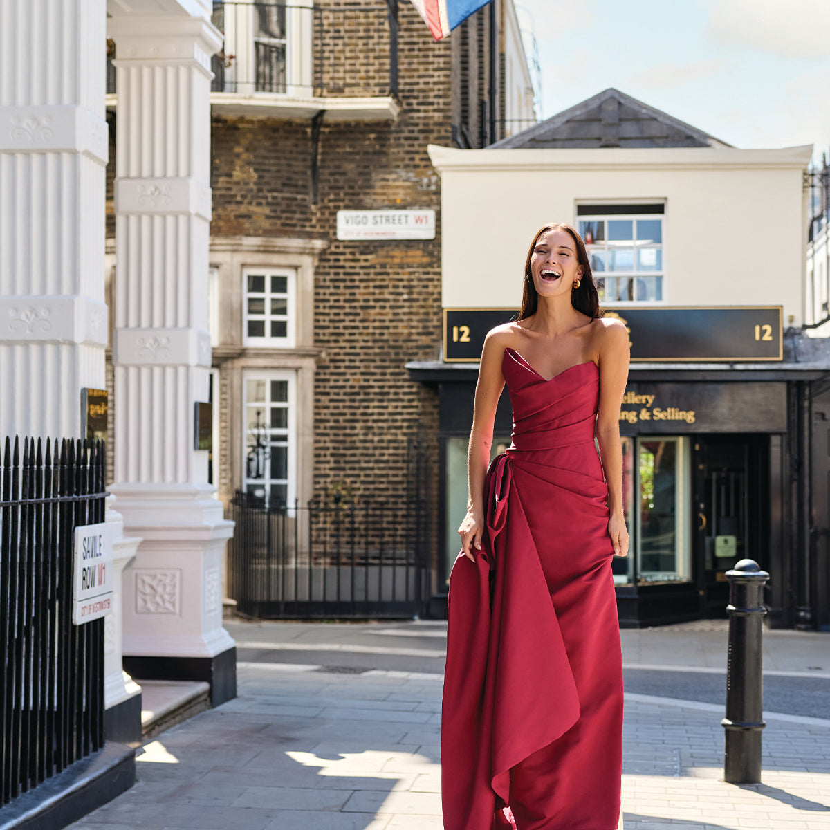 Monique Lhuillier Fall 2026 Rhubarb Silk Faille asymmetric strapless draped gown with train - lookbook.