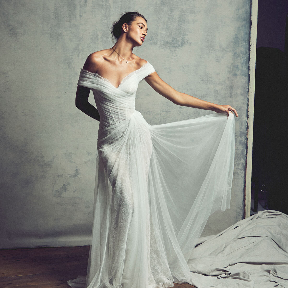 Monique Lhuillier Fall 2027 Bridal Shadow Off-the-shoulder dropped waist sheath gown in silk white Chantilly lace and Spanish tulle - lookbook.