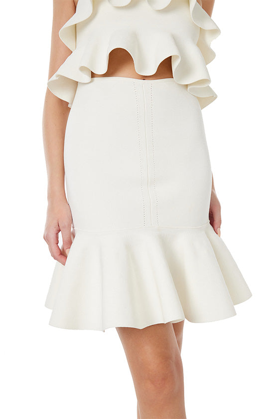 Monique Lhuillier white ruffle mini skirt in stretch fabric.