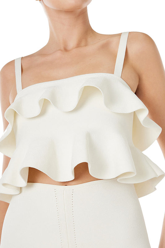 Monique Lhuillier white knit ruffle top with spaghetti straps and back gold zipper.