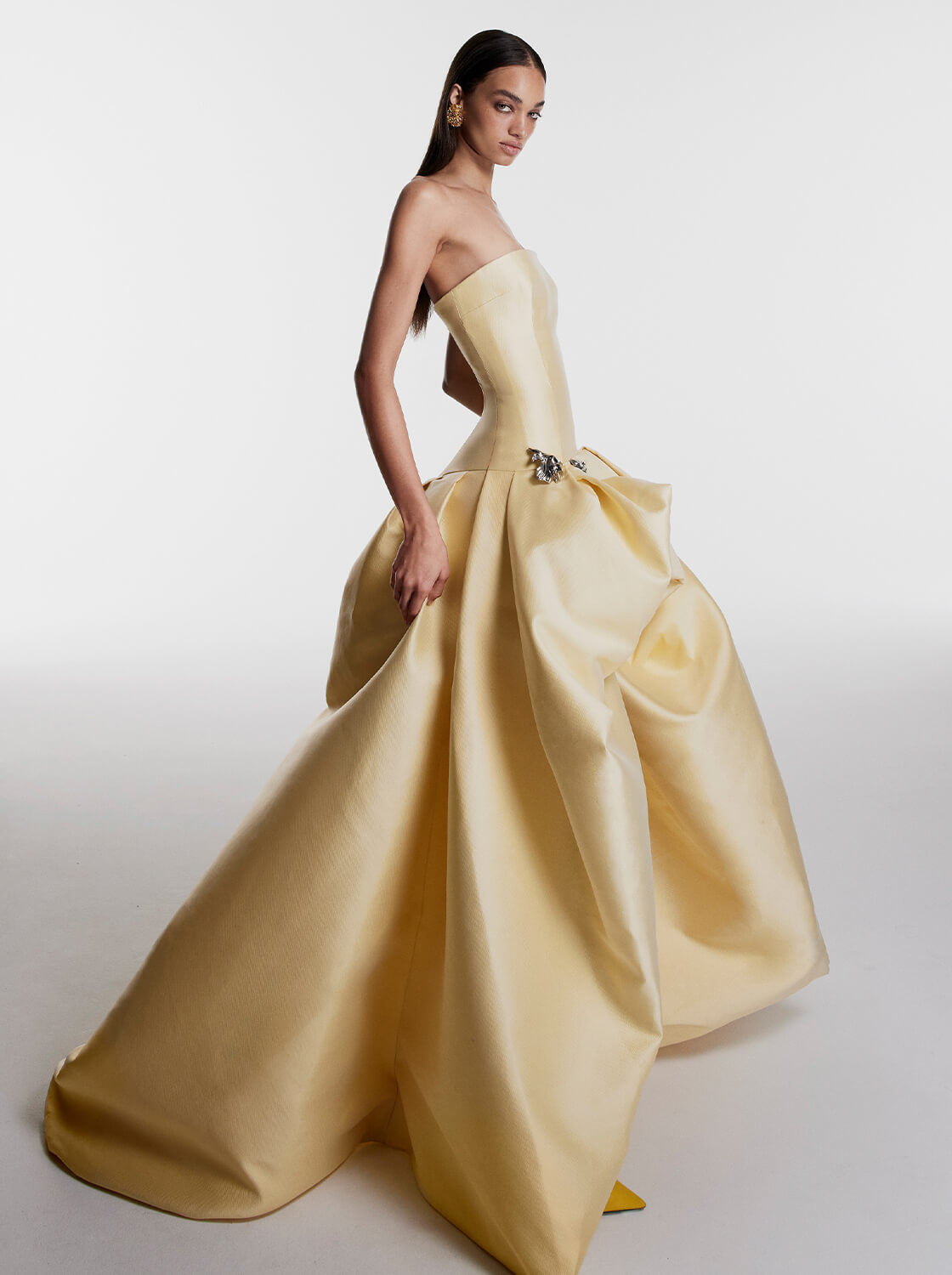 Monique Lhuillier Fall 2026 Pale Yellow Mikado Pique strapless ballgown with train and floral embellishment - lookbook.