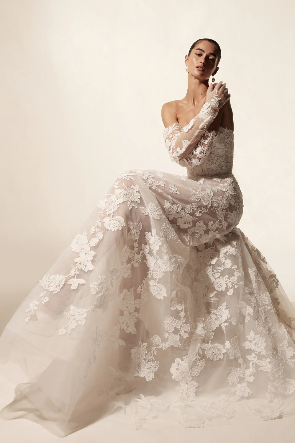 Monique Lhuillier Spring 2026 Bridal white lace strapless a-line Vida Gown with gauntlet sleeves