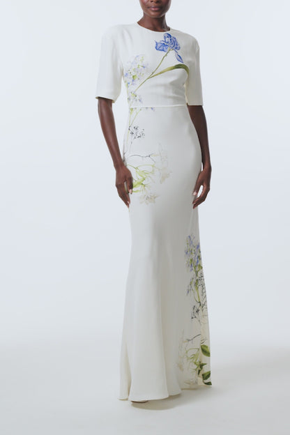 Monique Lhuillier Spring 2026 Ivory/Multi Iris Bouquet Printed CrepeShort sleeve bias gown - video.