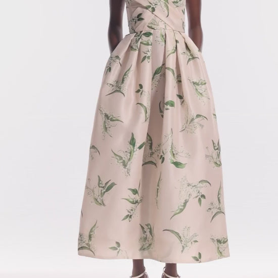 Monique Lhuillier strapless, midi length "Florette" dress in blush & leaf printed organza - video.