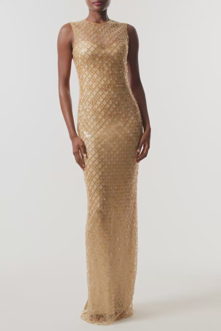 Monique Lhuillier Fall 2026 Gold Embroidered Tulle sleeveless column gown with lattice sequin embroidery - video.