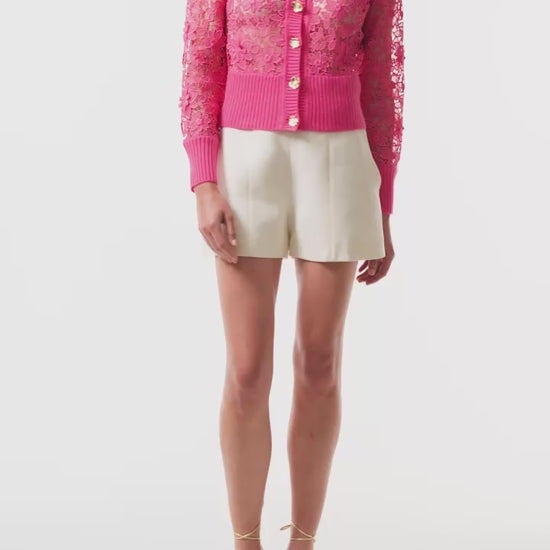 Monique Lhuillier Spring 2025 hibiscus lace cardigan with gold buttons - video.