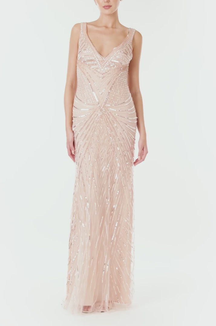 Monique Lhuillier Spring 2024 deep V-neck gown with wide straps in metallic and tonal embroidered tulle - video.