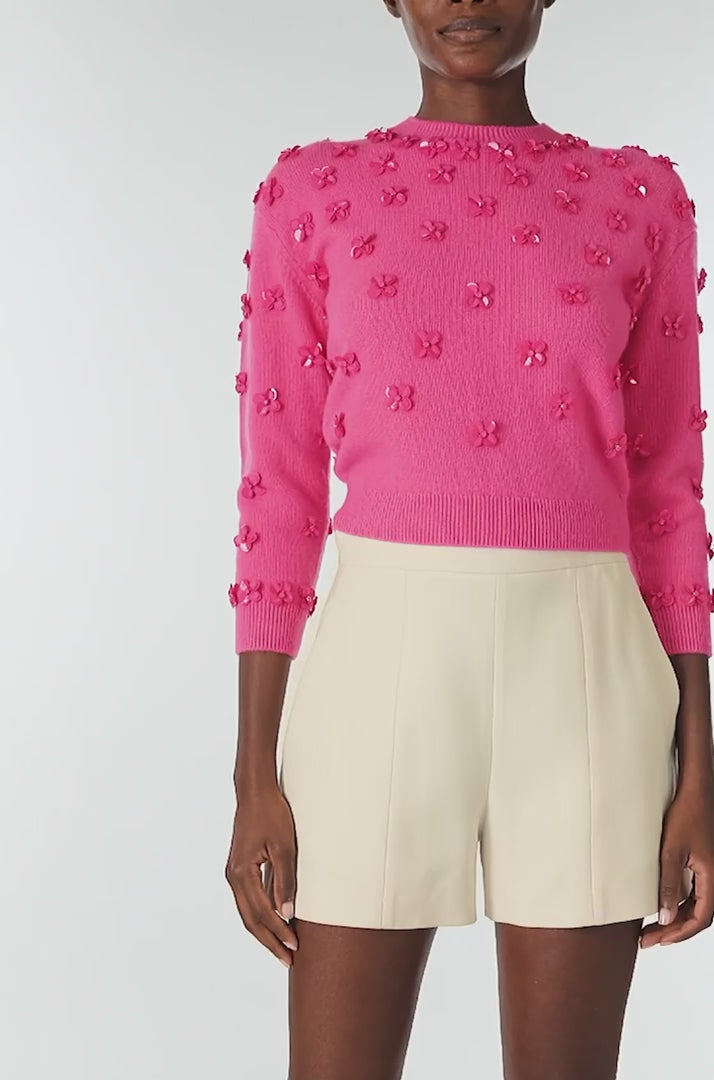 Monique Lhuillier Spring 2025 3/4 sleeve embroidered cashmere crewneck sweater in Hibiscus color - video.