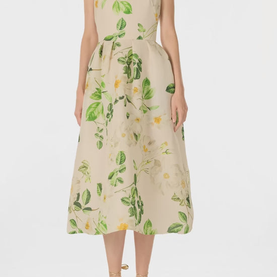 Monique Lhuillier Spring 2025 Rose print gazar sleeveless day dress with jewel neckline and pockets - video.