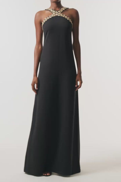 Monique Lhuillier Spring 2026 Noir Lightweight Silk Wool Suiting Cut - away neckline with gold crystal embroidery - video.