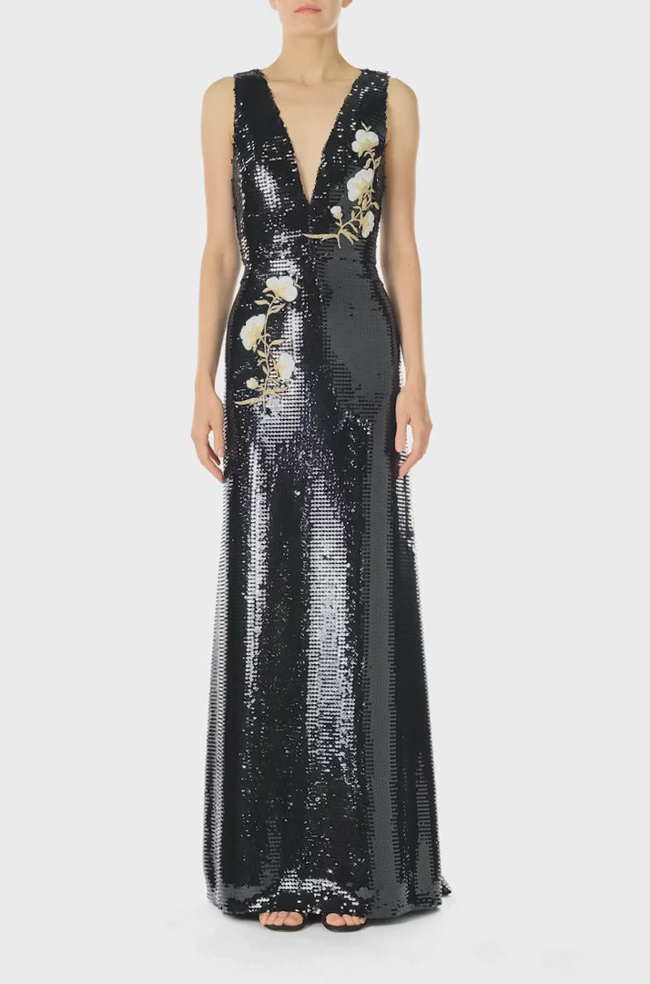 Monique Lhuillier Spring 2025 Deep V-neck gown in Noir sequin and floral embroidered appliques - video.