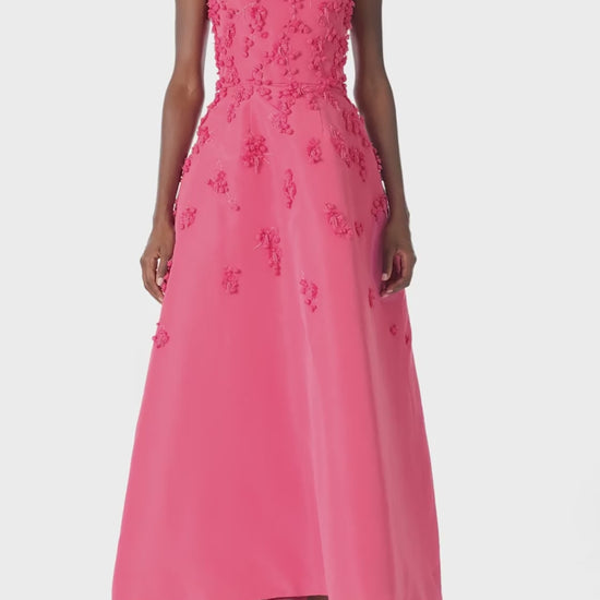 Monique Lhuillier Spring 2025 Tea-length dress with scoop neckline and spaghetti straps in Hibiscus floral embroidered faille fabric - video.