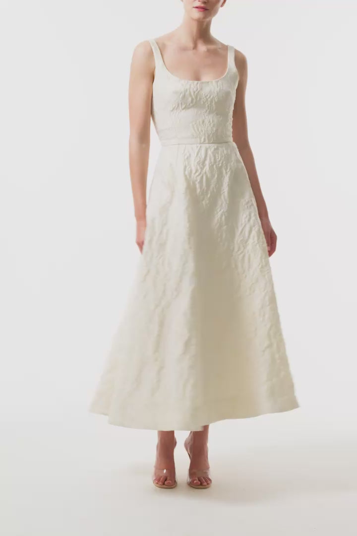 Monique Lhuillier Fall 2025 scoop neck, a-line dress in ivory floral jacquard fabric - video.