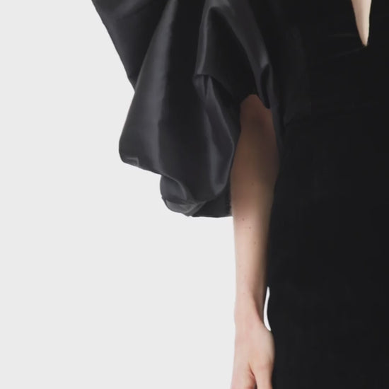 Monique Lhuillier puff sleeve bolero in noir mikado fabric.