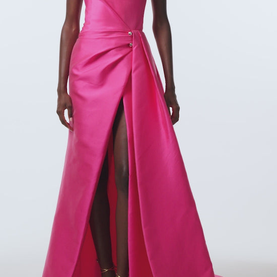 Monique Lhuillier Spring 2026 Flamingo Mikado One shoulder draped gown with train and gold ball piercing - video.