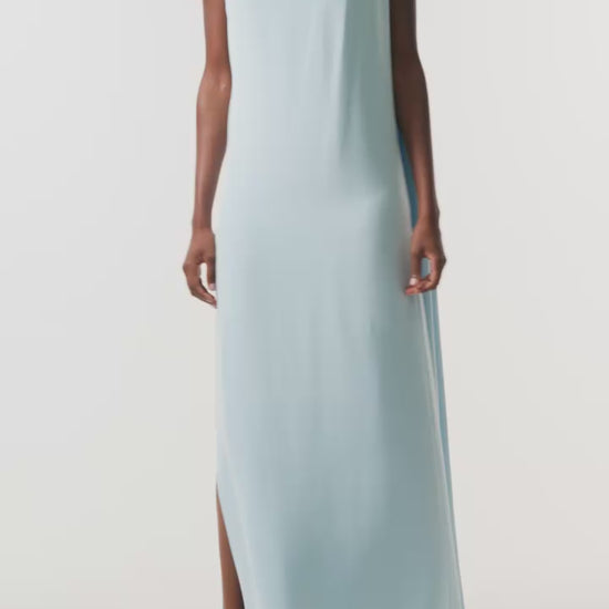 Monique Lhuillier Spring 2026  Powder Blue Crepe Draped Caftan Gown with integral back streamer and low v-back -  video.