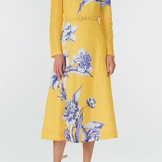 Monique Lhuillier Spring 2025 Floral printed linen long sleeve day dress with jewel neckline and circular skirt in yellow sunflower print - video.