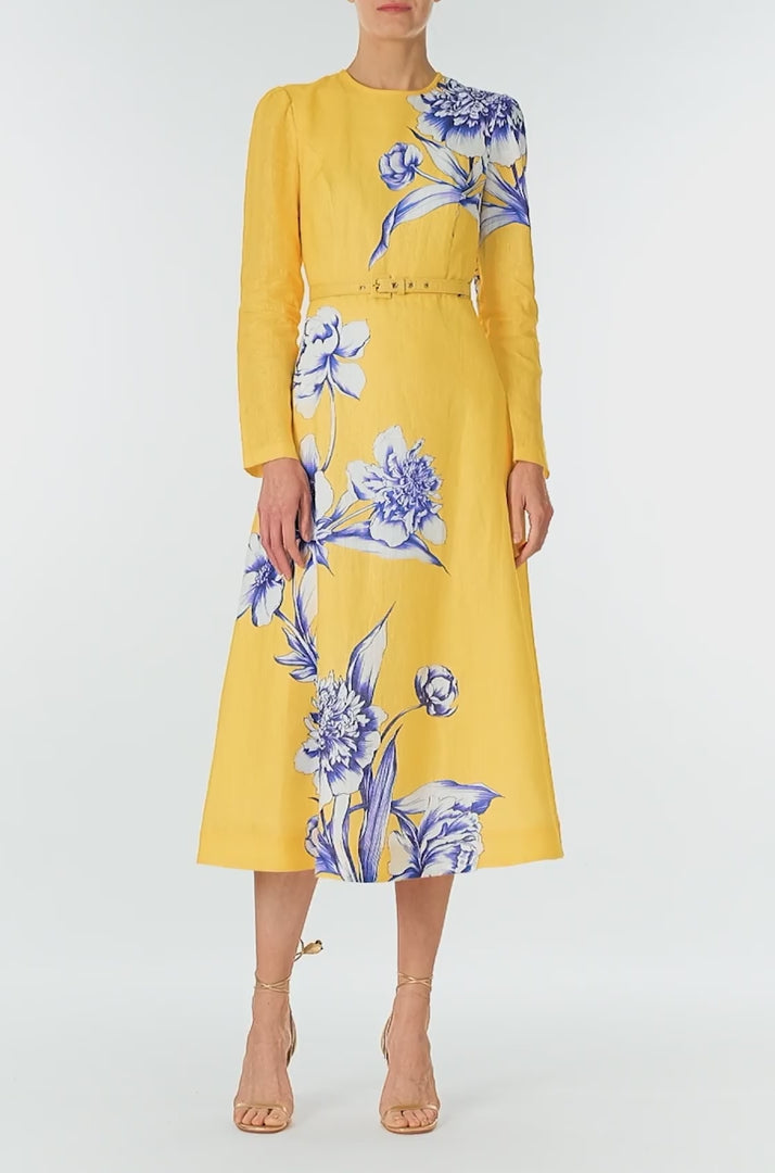 Monique Lhuillier Spring 2025 Floral printed linen long sleeve day dress with jewel neckline and circular skirt in yellow sunflower print - video.