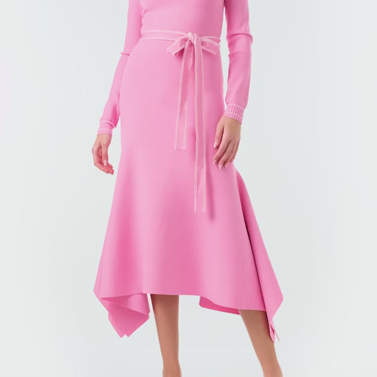Monique Lhuillier Fall 2024 pink knit long sleeve dress with handkerchief hem and self-tie belt - video.