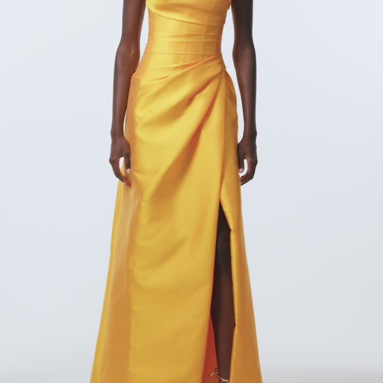Monique Lhuillier Spring 2026  Mikado Mango strapless corseted draped gown with slit -video.