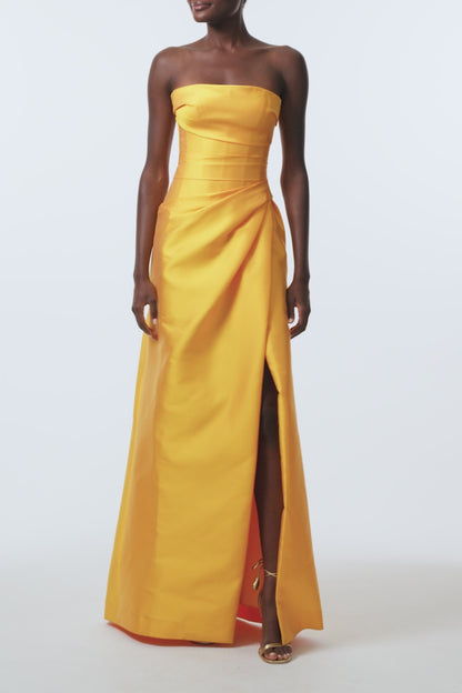 Monique Lhuillier Spring 2026  Mikado Mango strapless corseted draped gown with slit -video.