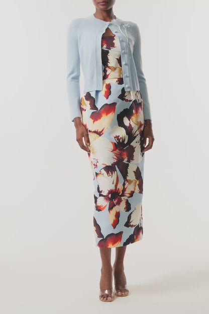 Monique Lhuillier Fall 2026 pale blue cashmere cardigan with floral applique - video.