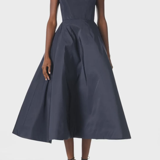 Monique Lhuillier Fall 2024 Bateau neck, cap sleeve dress with full tea length skirt in night sky silk faille - video.