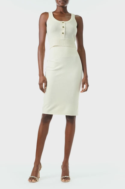 Monique Lhuillier Spring 2024 white cropped cashmere tank with scoop neck and gold button closure - video.