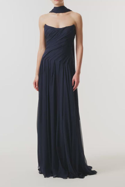 Monique Lhuillier Fall 2026 Navy chiffon strapless draped gown with scarf - video. 
