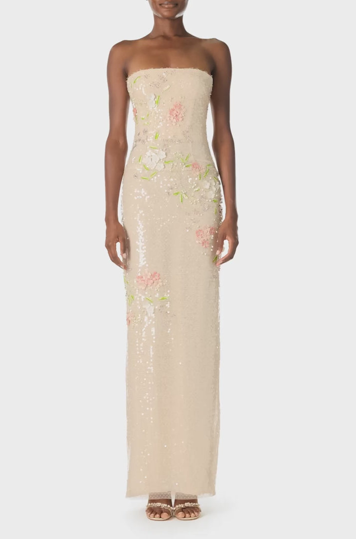 Monique Lhuillier Spring 2025 Strapless, column gown in all-over prosecco colored, floral embroidered sequins - video.