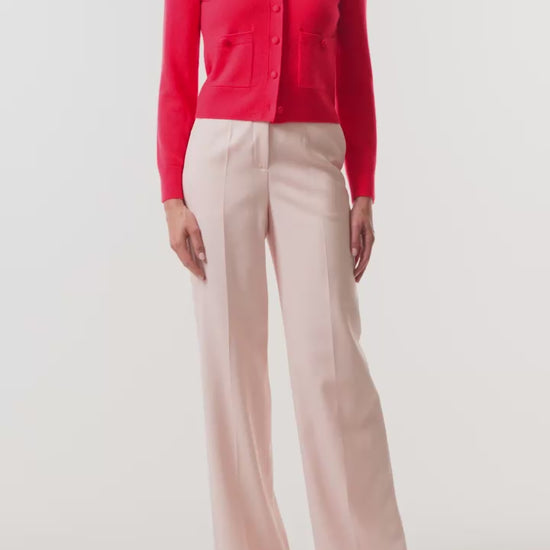 Monique Lhuillier Spring 2026 long sleeve Poppy Cashmere Cardigan with pockets and button front closure- video.