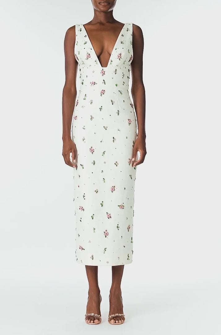 Monique Lhuillier Spring 2025 Floral embroidered silk white linen cocktail dress with deep V-neckline - video.