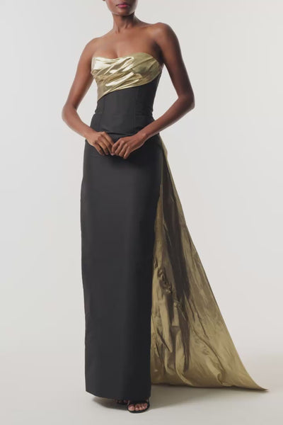 Monique Lhuillier Fall 2026 Noir/Gold lamé and faille strapless draped column gown and train - video.