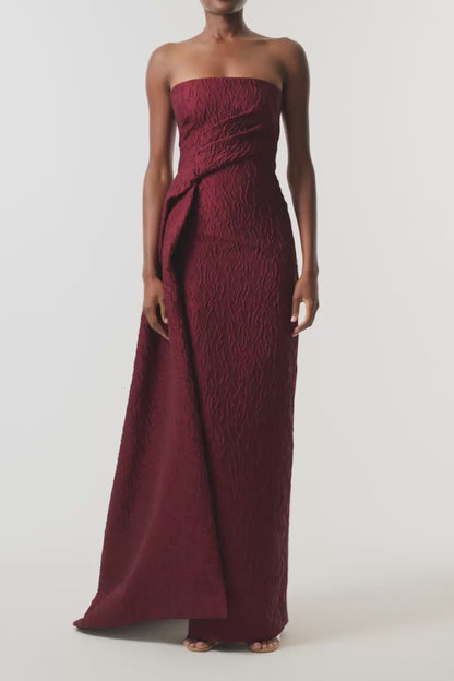 Monique Lhuillier Fall 2026 Rhubarb Jacquard strapless draped column gown with side train - video.
