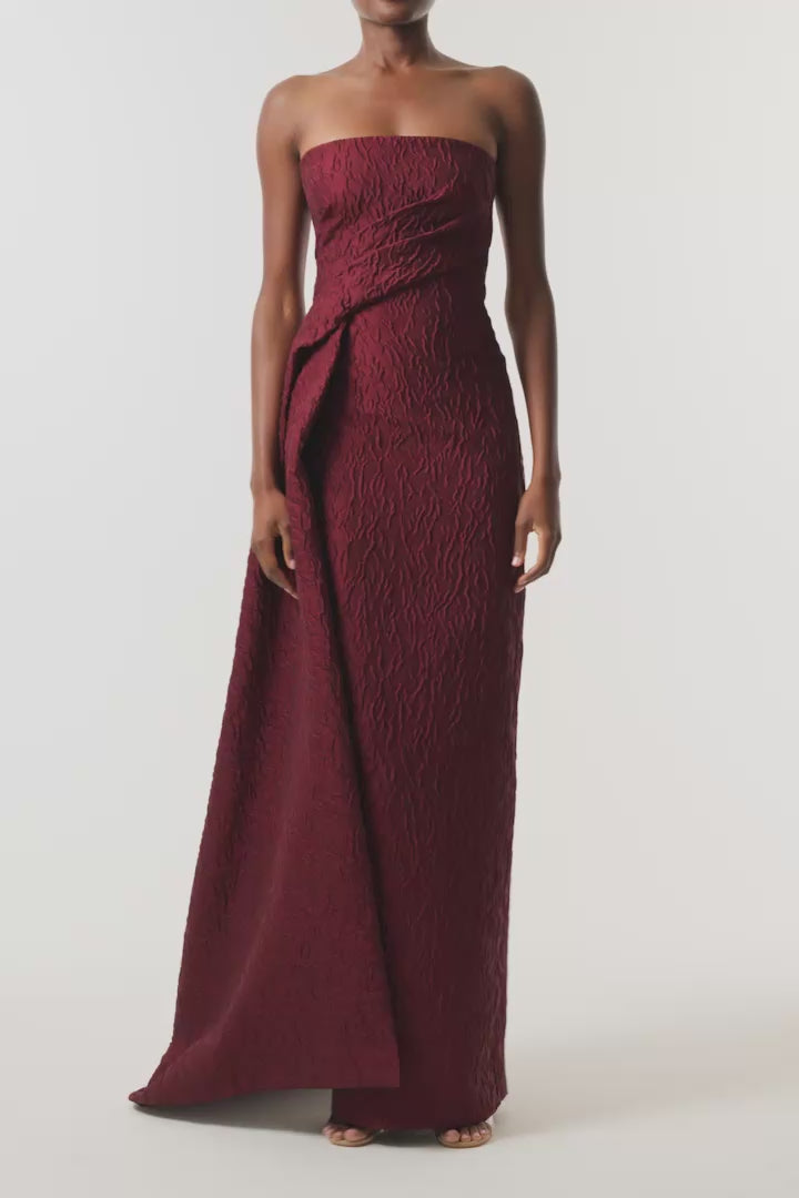 Monique Lhuillier Fall 2026 Rhubarb Jacquard strapless draped column gown with side train - video.