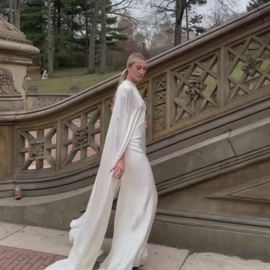 Silk white satin "Viola" cape with long back train and rounded front.  Shown over the Viola silk white satin floor length gown - video.