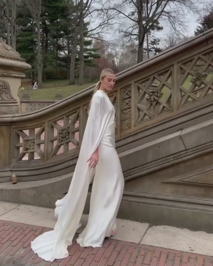 Silk white satin "Viola" cape with long back train and rounded front.  Shown over the Viola silk white satin floor length gown - video.