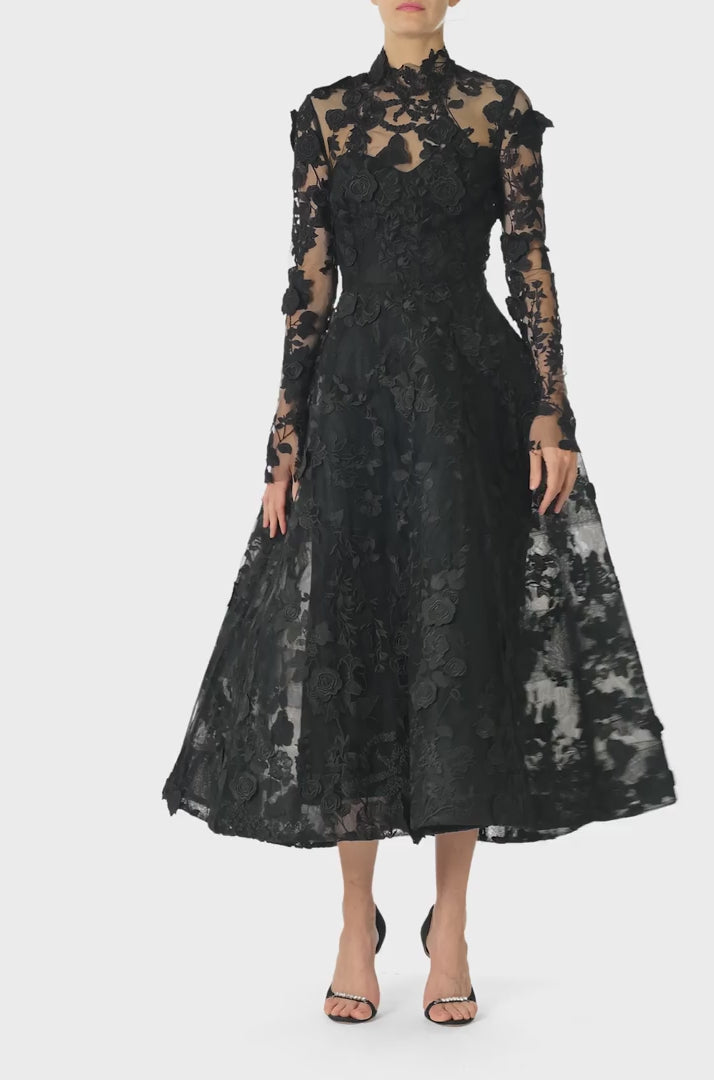 Monique Lhuillier Fall 2024 high neck, long sleeve noir lace jacket with hook and eye closure - video.