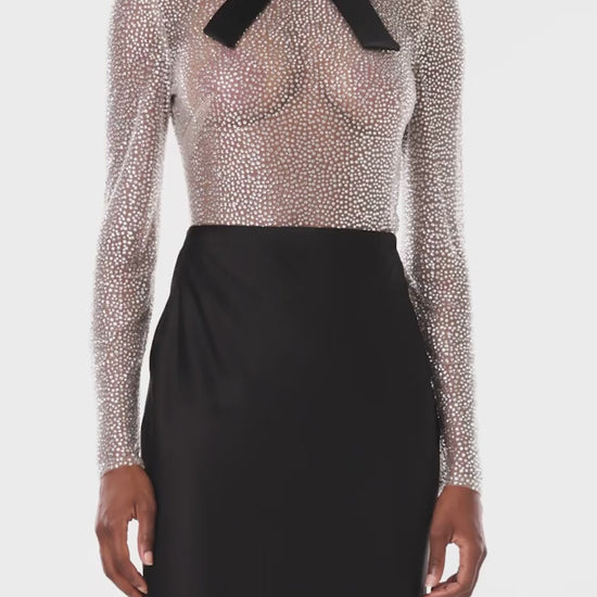 Monique Lhuillier Spring 2024 sheer, silver embroidered body suit with attached collar and detachable, self-tie bow - video.