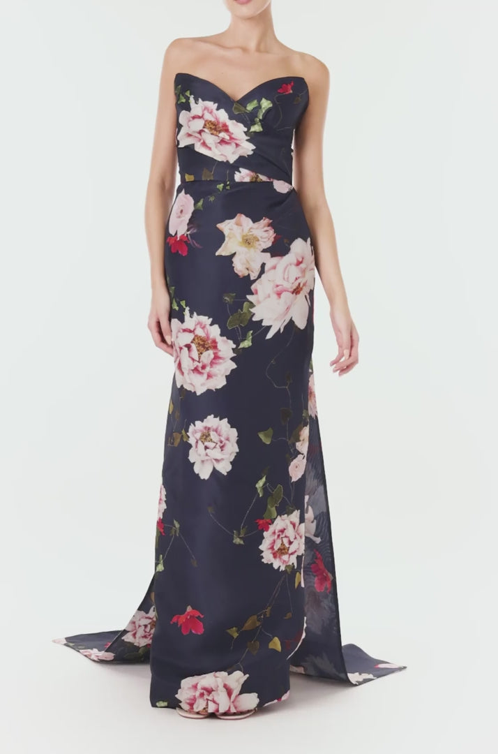 Monique Lhuillier navy floral gazar gown with strapless, sweetheart neckline and train.